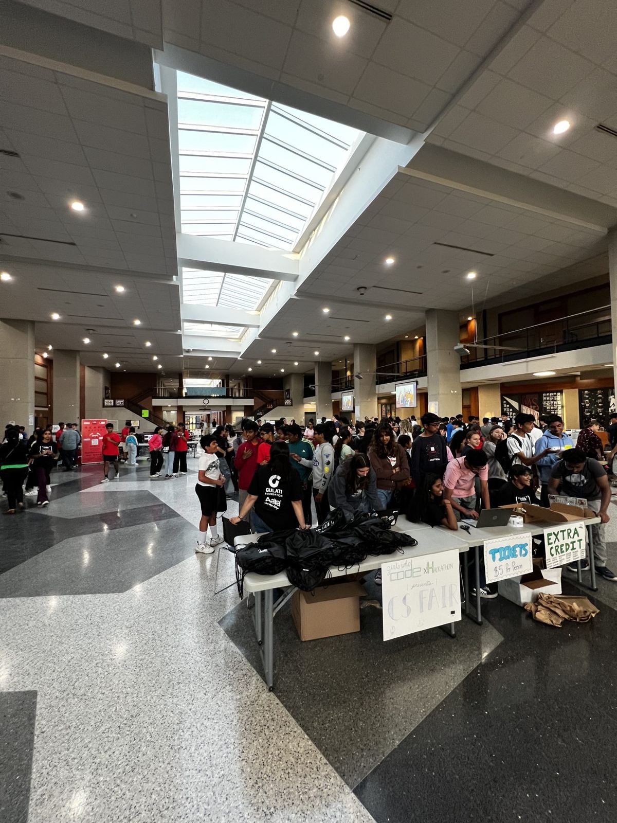 Crowd of students in the high school commons